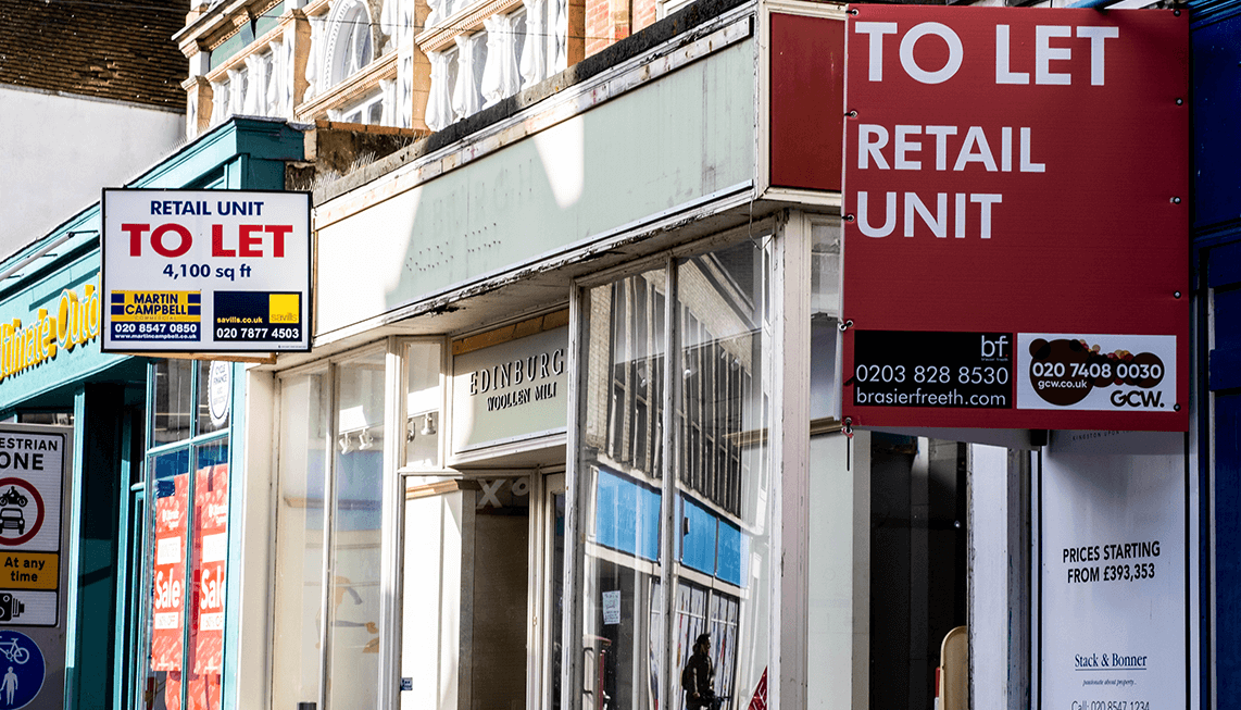 Shop fronts with letting boards